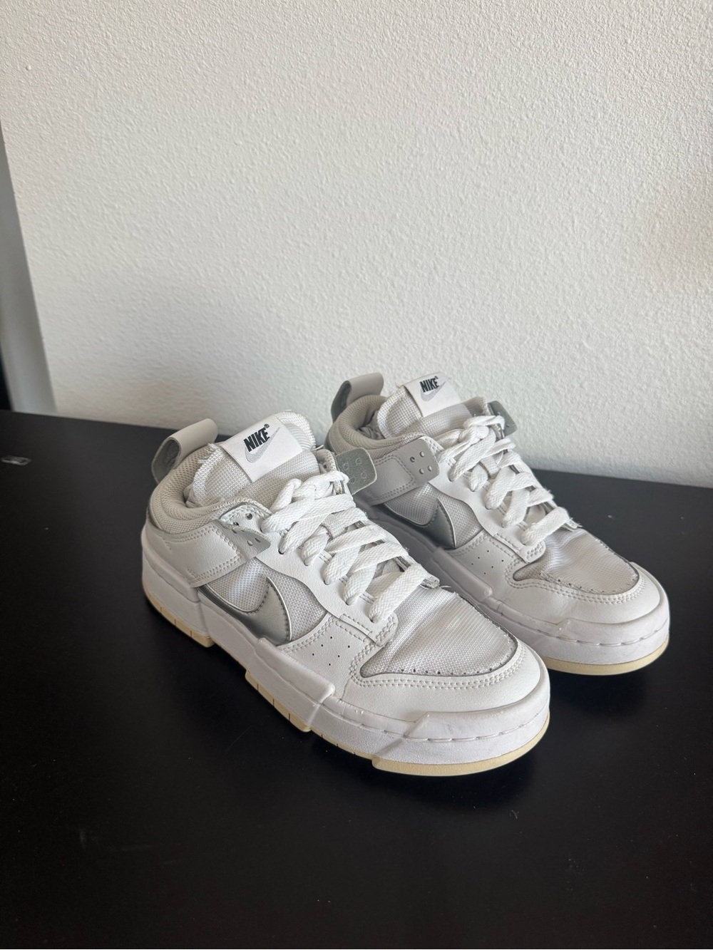 Women’s Nike White and Silver Low-Top Sneakers